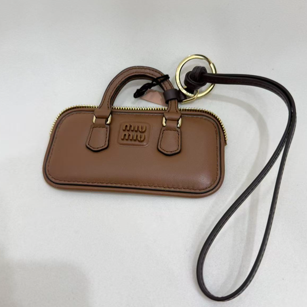 未使用 MIU MIU/缪缪  徽标拉链牛皮包包挂饰