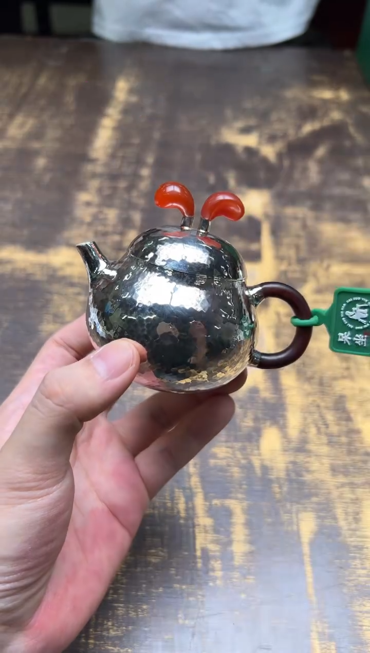 呆坐 锤纹红玛瑙兔耳梨型壶
