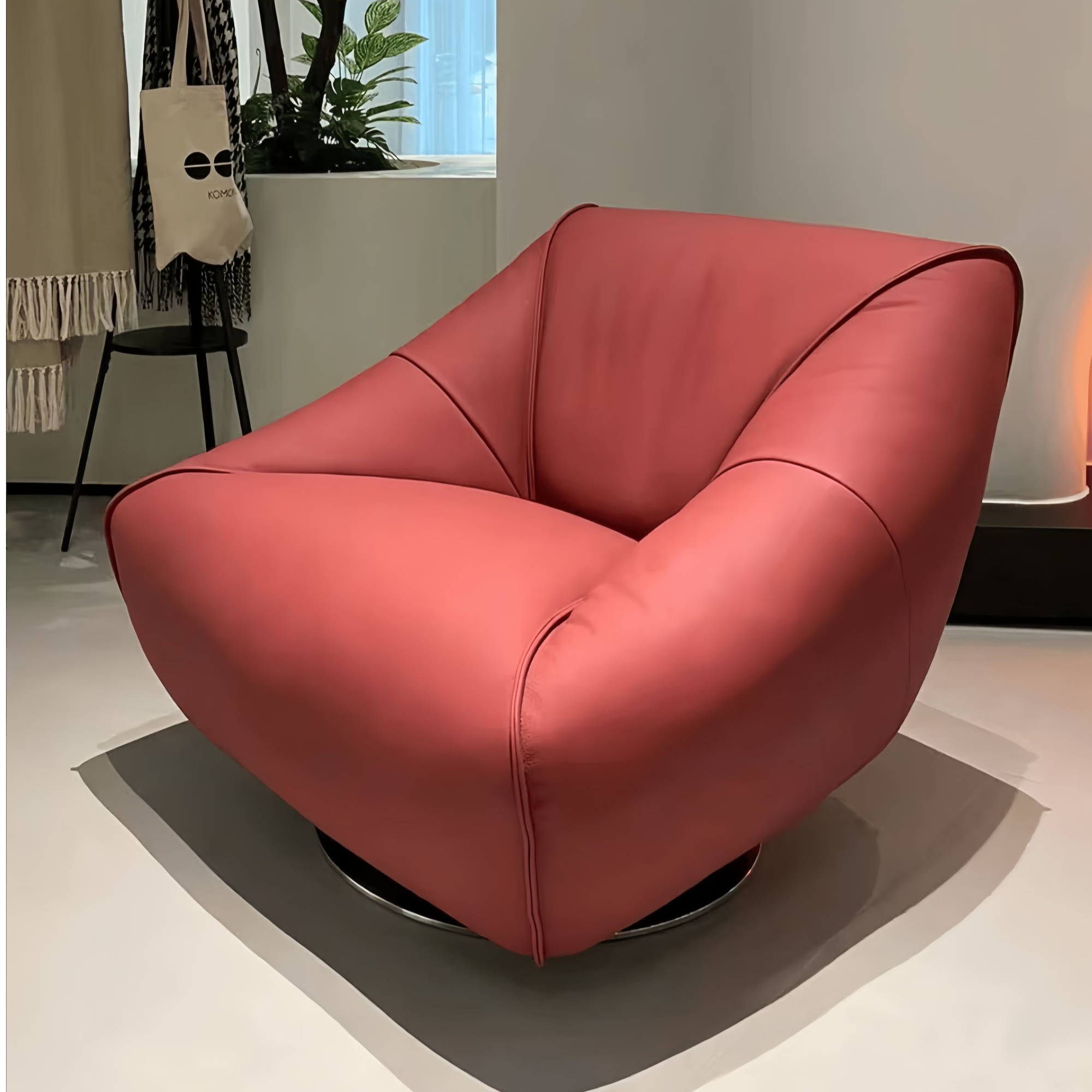 轻奢时尚粉色客厅创意简约旋转单人纳帕皮家用阳台皮艺大黑牛沙发