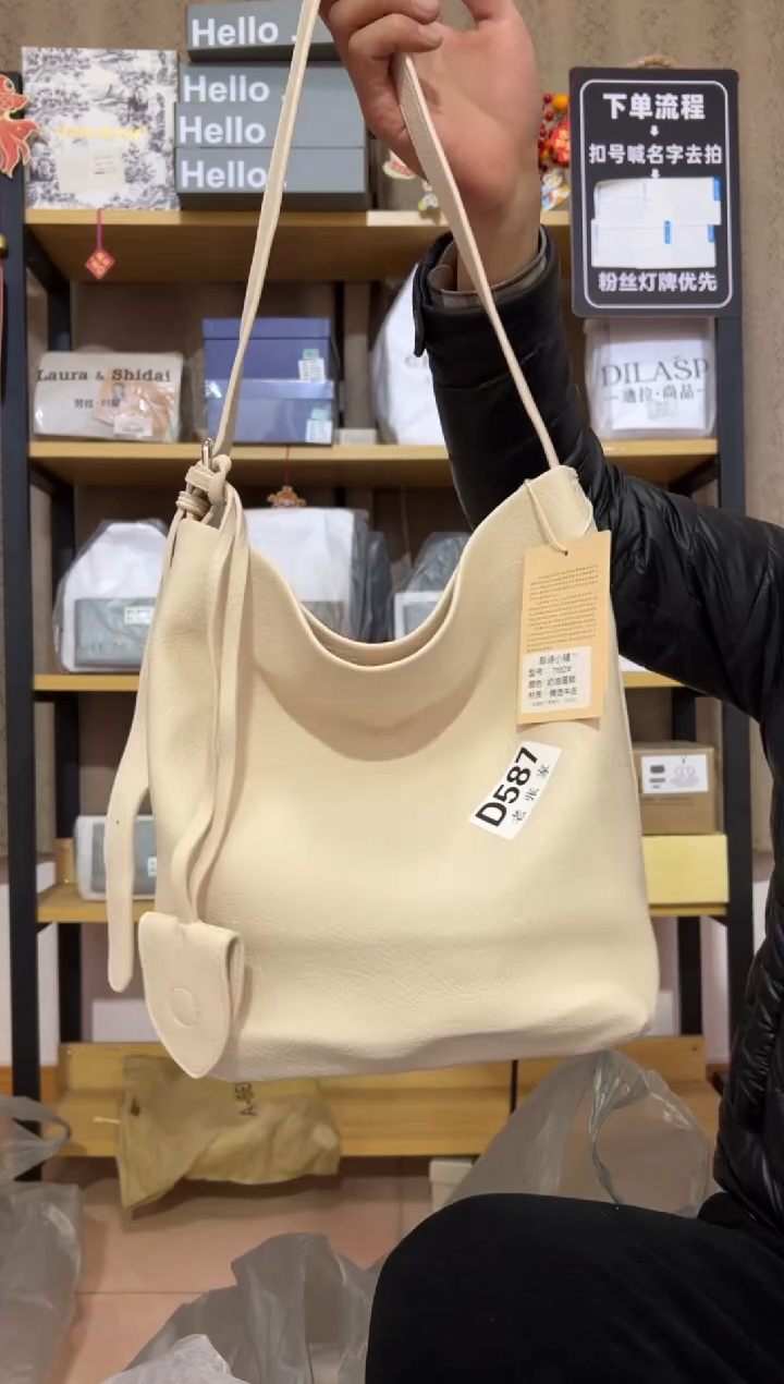 小牛剖层皮革老张家女包587