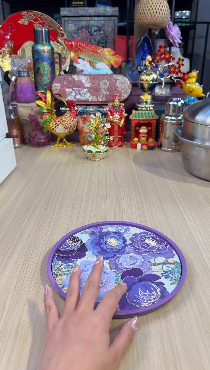 135紫色花圆形吸水壶承