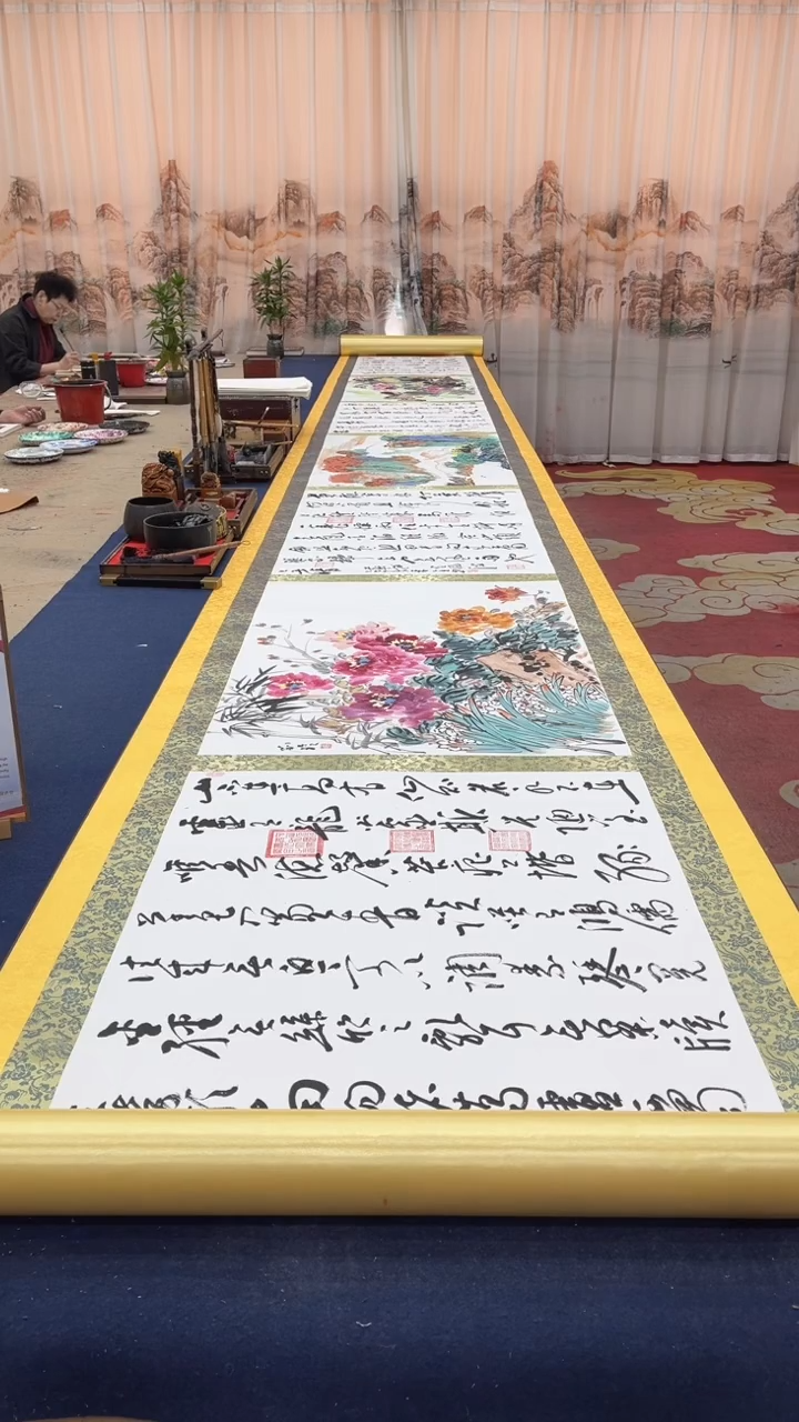 书法多人书画合作十米乘一米大金卷