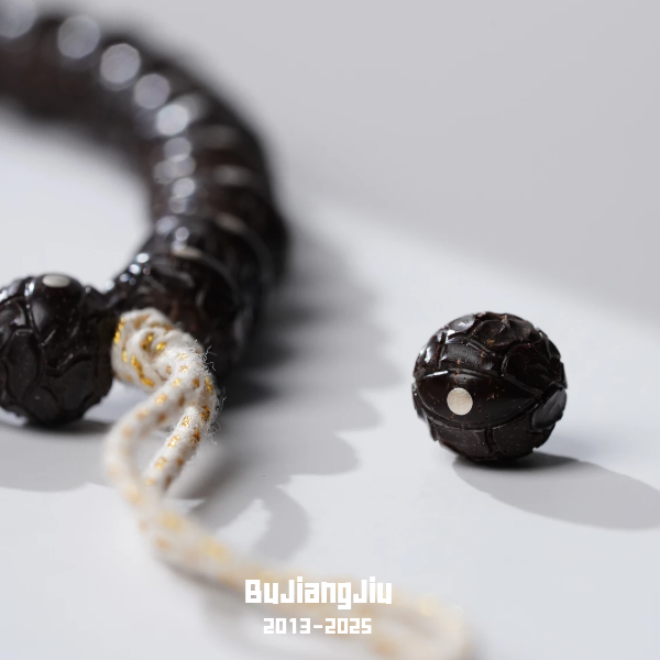 不将就出品印尼原生态纯手工圆珠雕刻魔瞳凤眼椰蒂手串手持