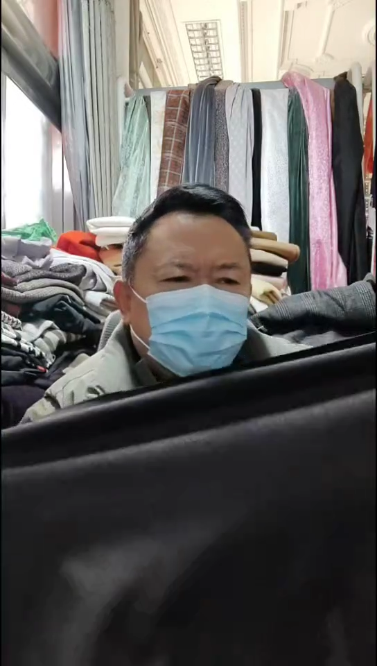 深紫咖雪花针织布料