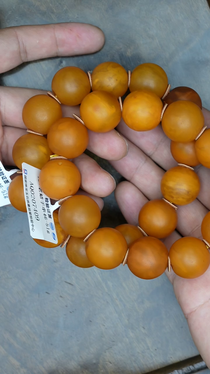 【闪购商品】琥珀裸石未镶嵌老蜡微瑕橘皮圆珠手串多样性发其一