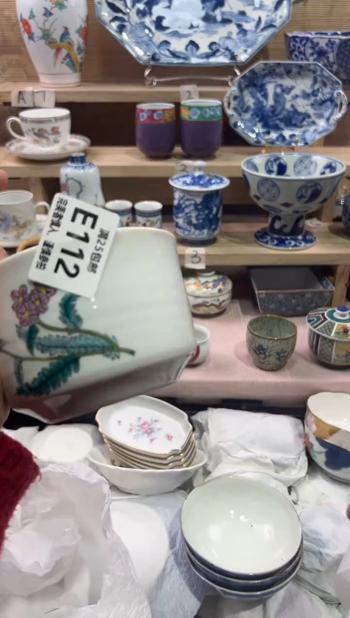 瓷片随*。             E112