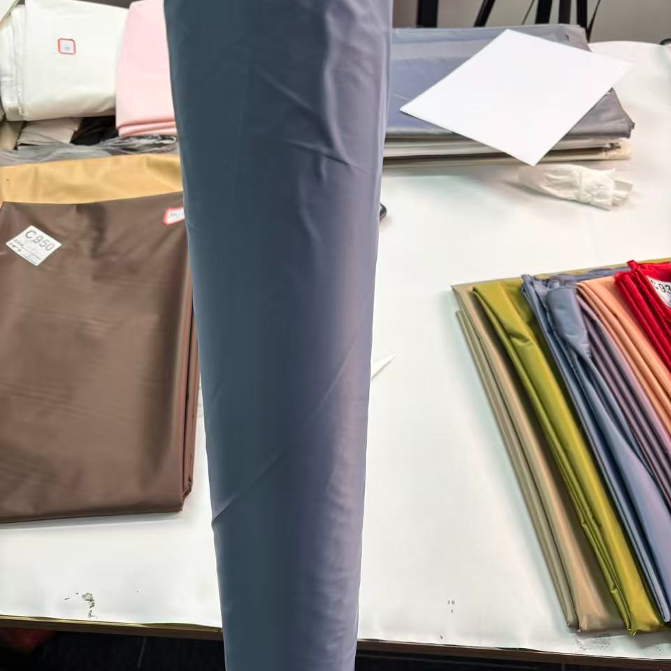 F052灰蓝色 超细旦无胆防绒羽绒服面料