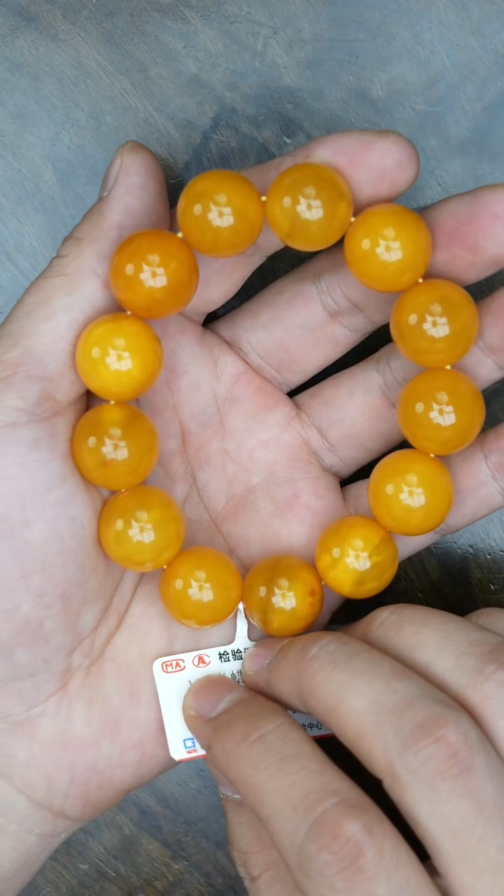 【闪购商品】琥珀裸石未镶嵌老蜡微瑕亮面圆珠手串