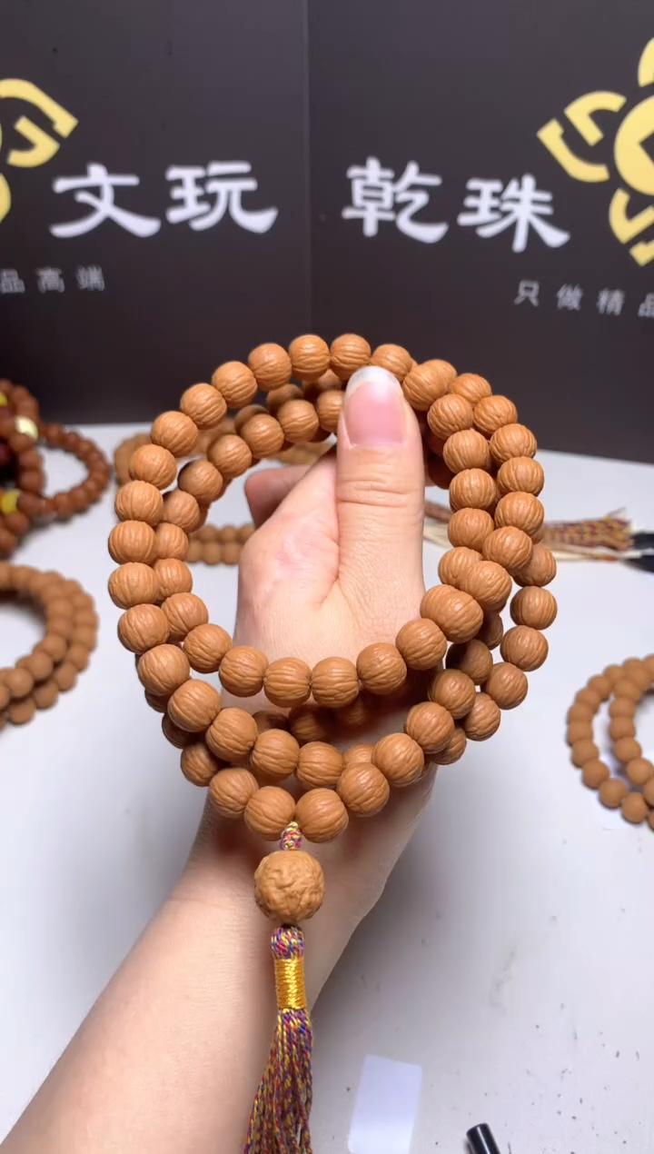 手串猴头核桃铁*10＋精修凤羽脖挂