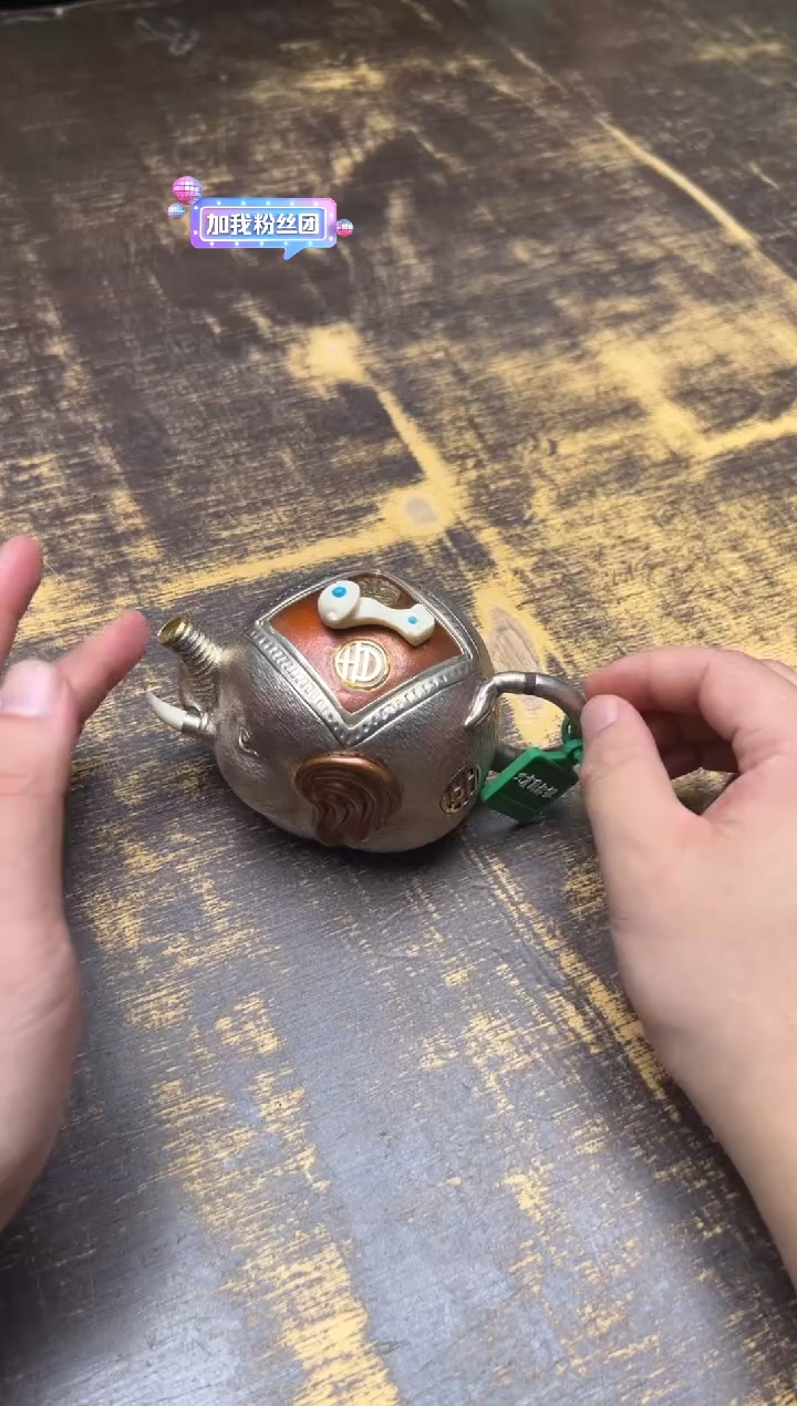 H****0呆坐铜包银大象壶