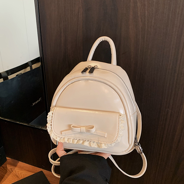 夏天超火黄色双肩包包女2025新款高级感轻奢小众设计通勤单肩背包