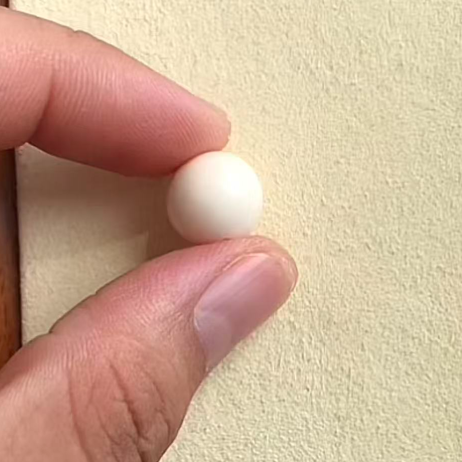 珊瑚圆珠一颗-孔道扩1.5