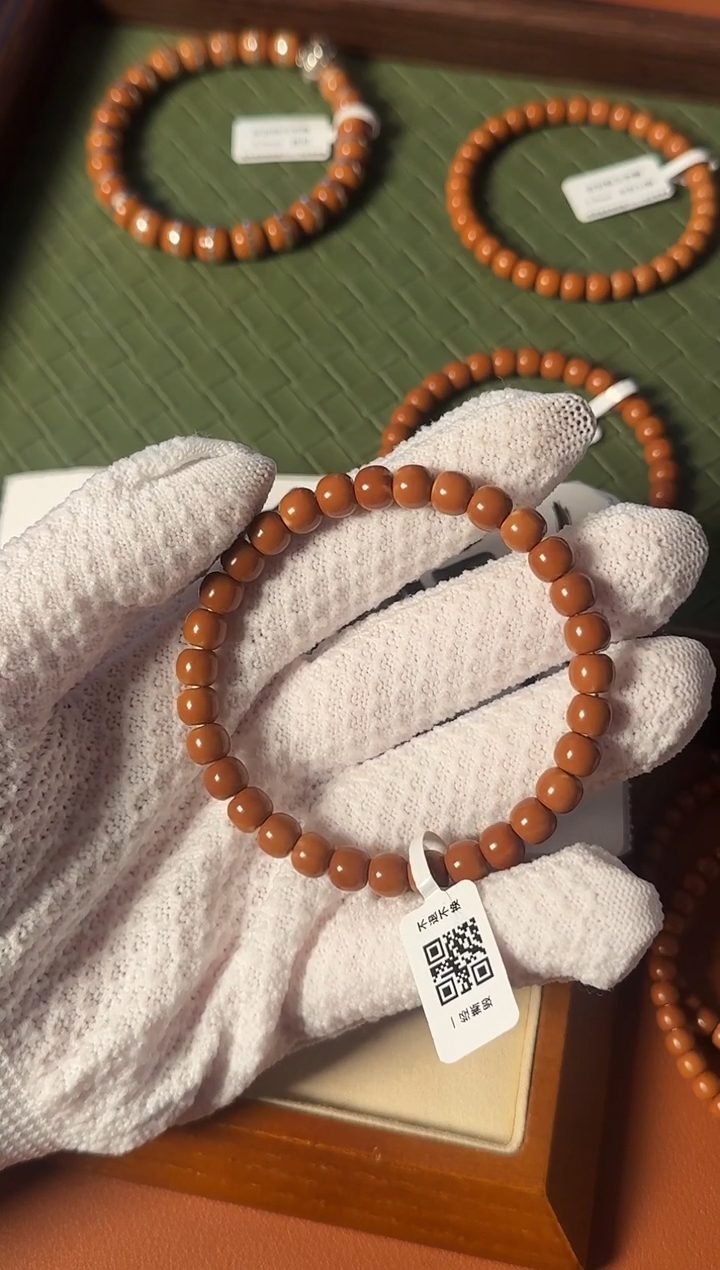 手串橄榄核【168核尖】7.4mm老挝核尖老型单圈 三花微白树王老料