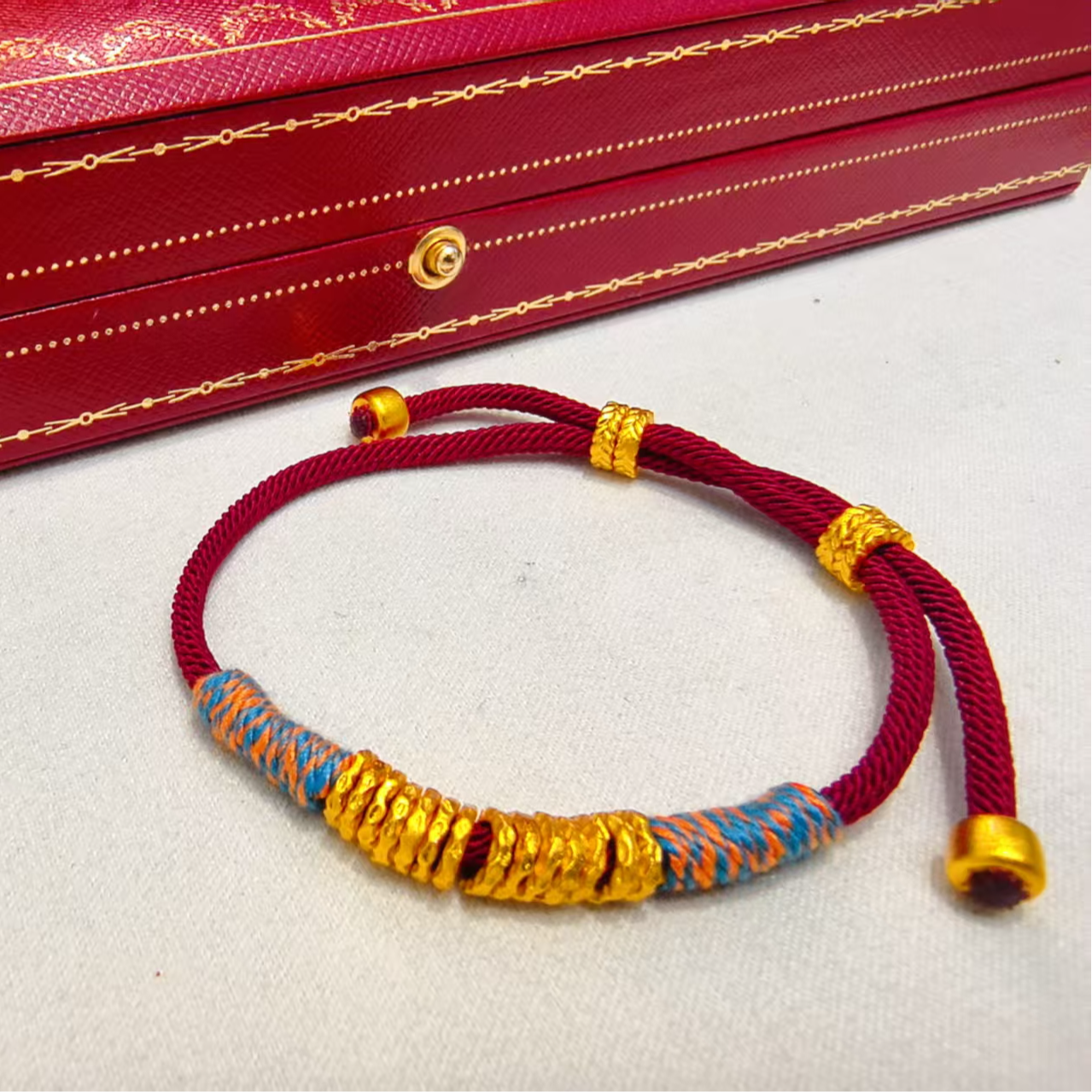 钛钢手链 新中式盘缠百搭时尚情侣五彩金手链手工红色手链256