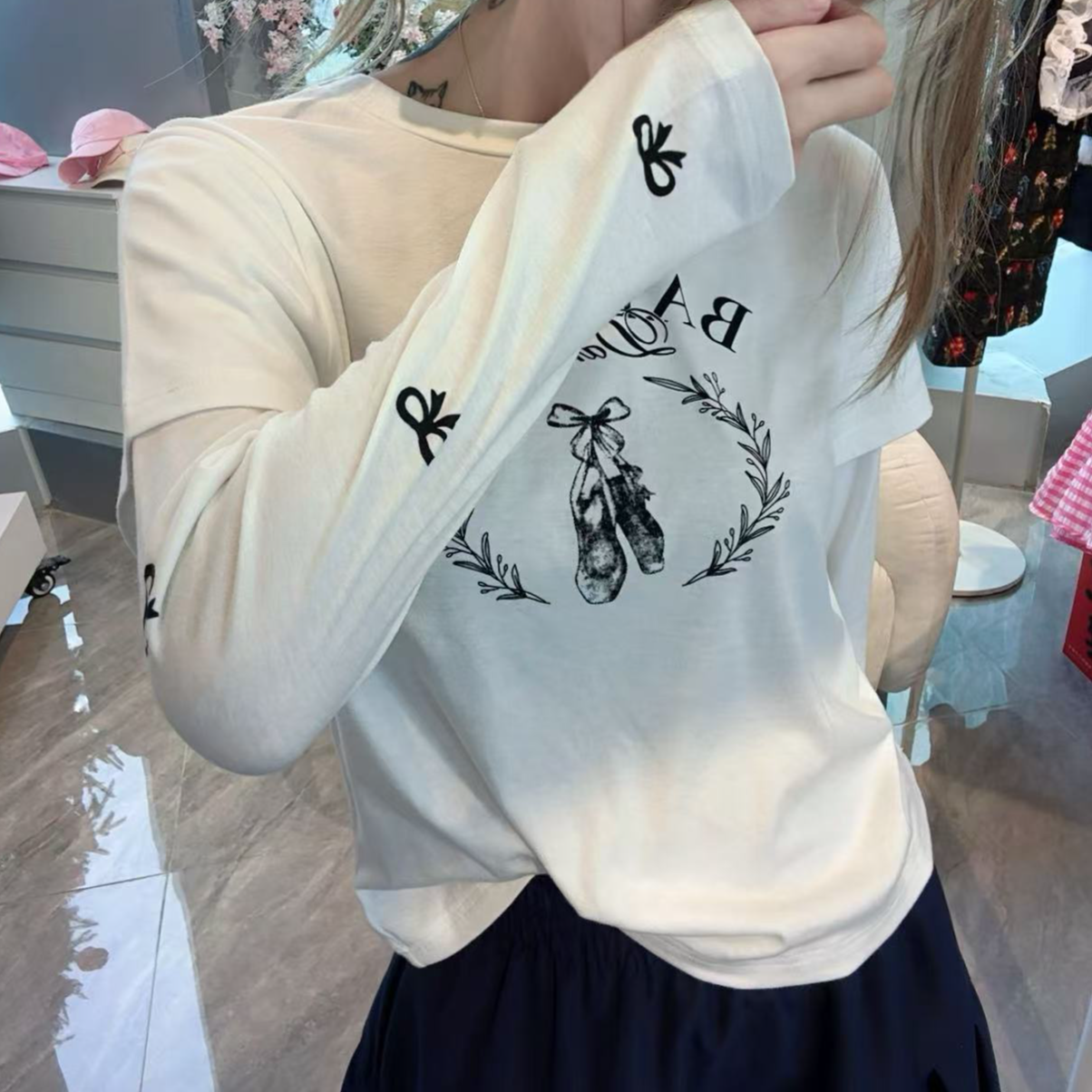 （雪糕）韩国东大门早春款白色假两件蝴蝶结字母印花长袖T恤C376