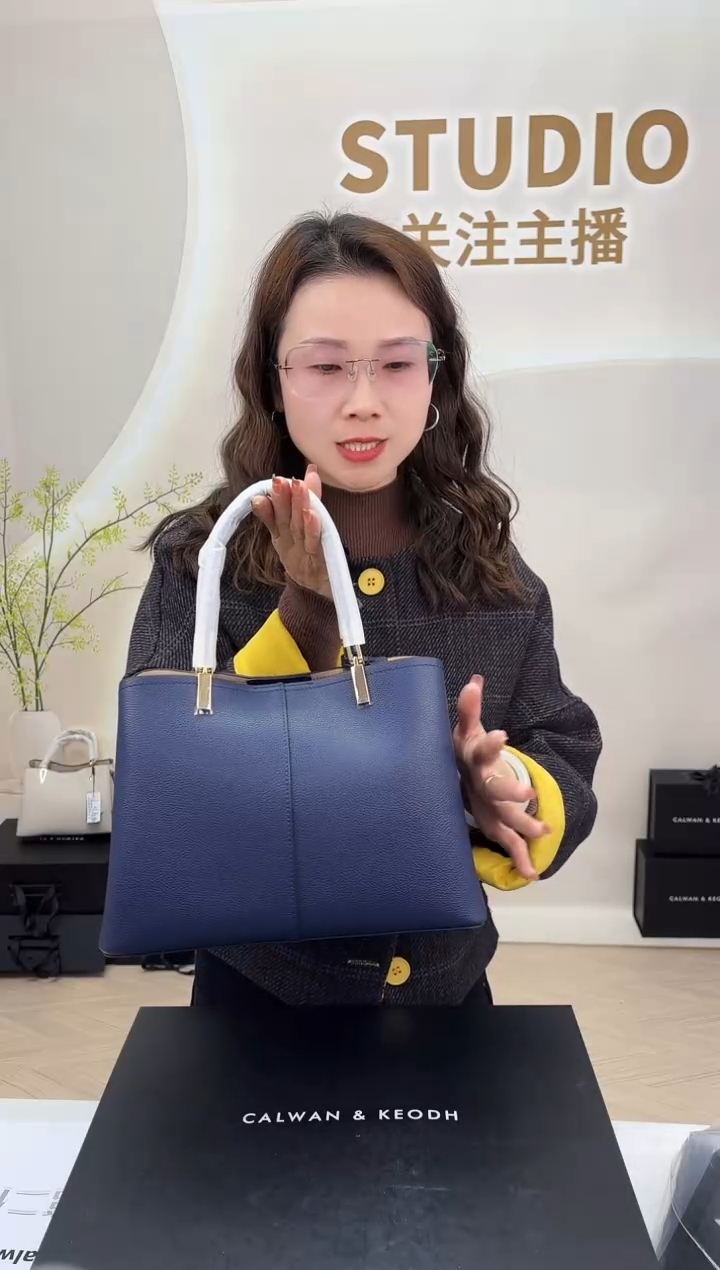 牛皮包包特价679