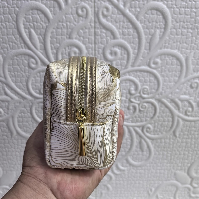 雅诗兰黛新款白金奢宠印花系列便携简约化妆包手拿包收纳【A1812】