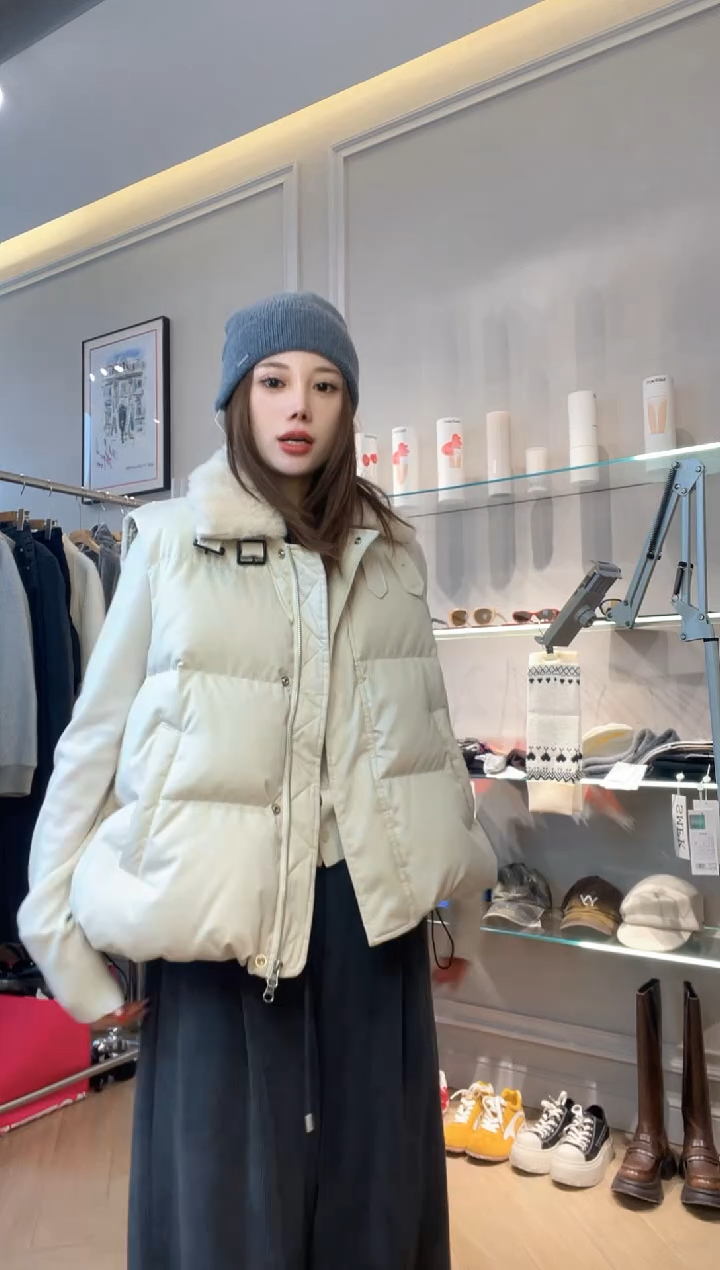 coacara 鹅羽羽马甲备注尺码sm  原价3180