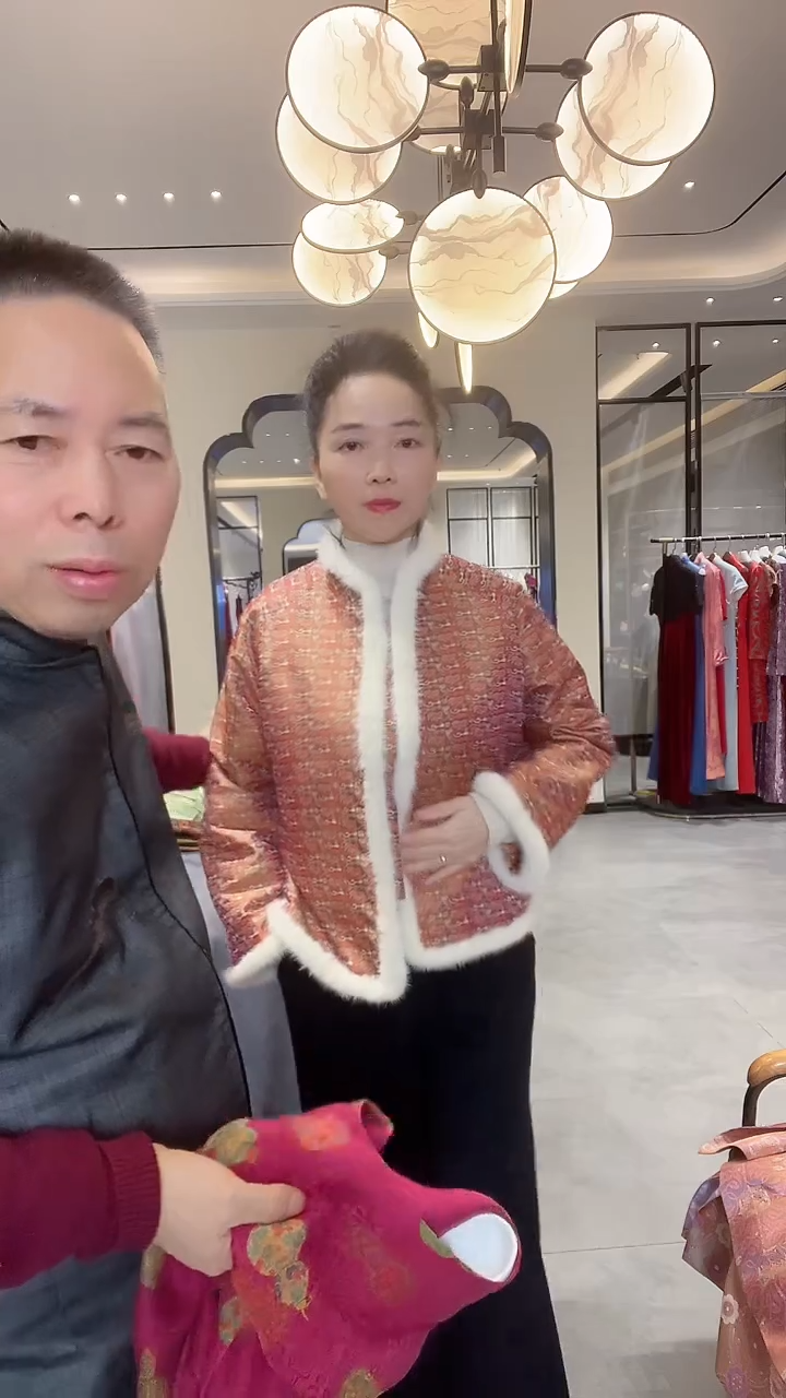 织绣橙色高定款加毛边上衣 999 l码