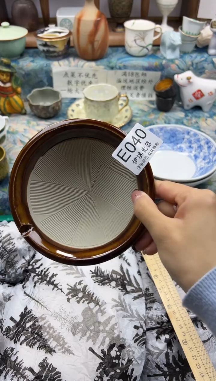 瓷片陈****）           E040