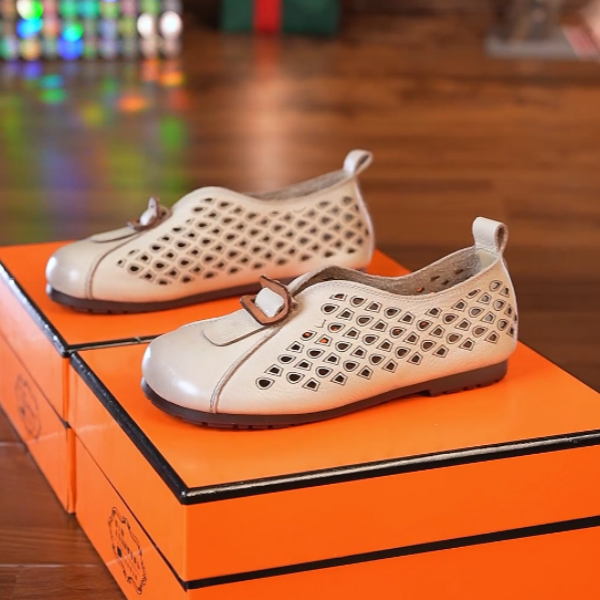 A洞洞鞋真皮2025春夏新款平底舒适百搭镂空女软底透气鞋女复古豆