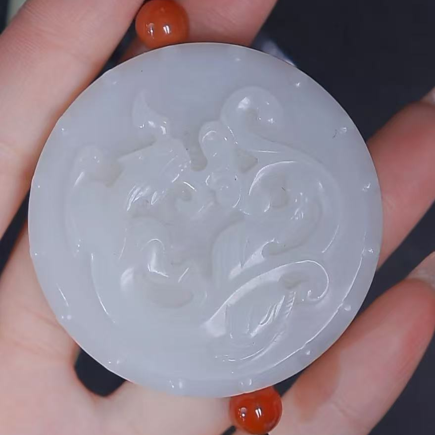 清代和田玉螭龙圆牌1