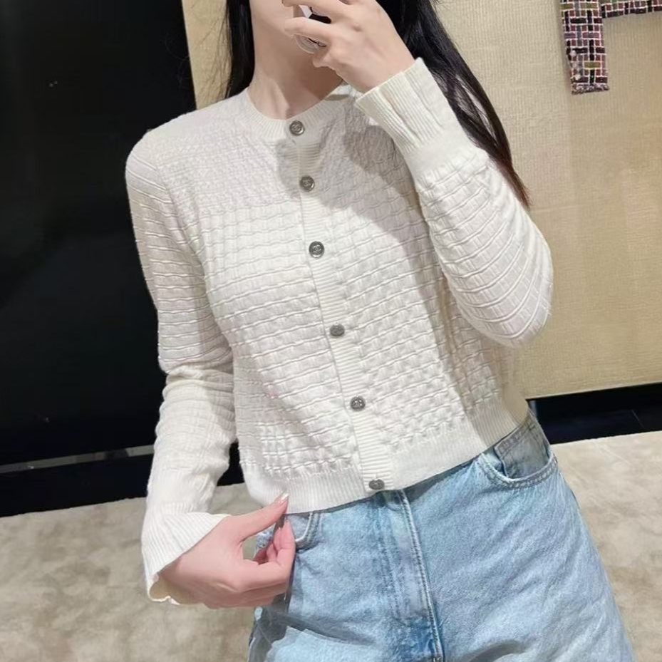 99新 Chanel/香奈儿 40码23B米白色喇叭袖圆领针织上衣