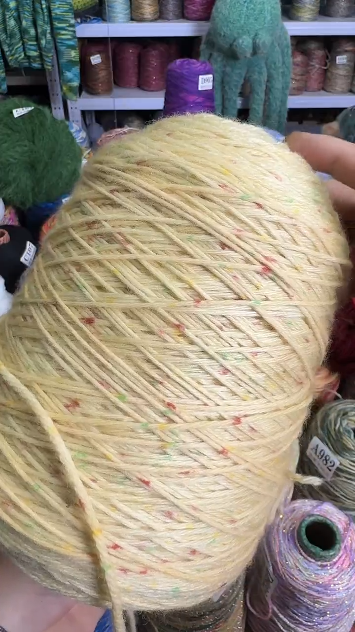 羊毛喷然彩点米黄色1.8斤