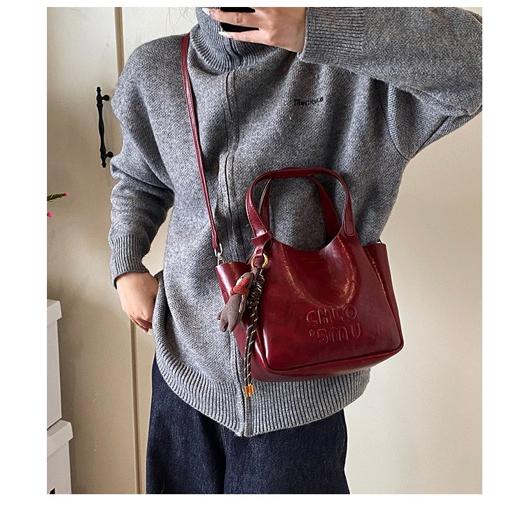 纯色磁扣水桶包磁吸扣单根斜挎包气质女士单肩