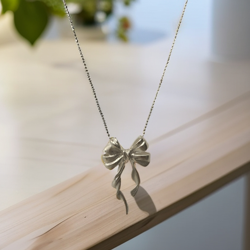 坠链均足银  蝴蝶结时尚百搭项链