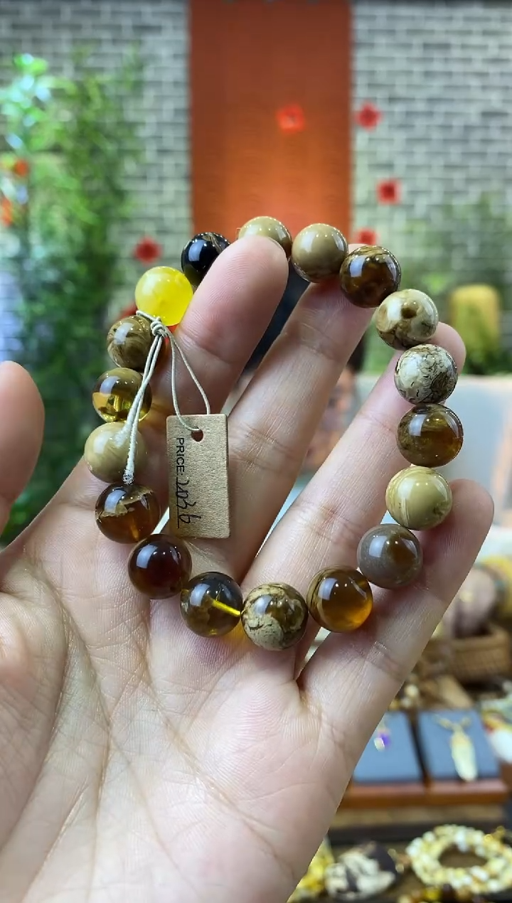 【闪购商品】蜜蜡裸石未镶嵌11mm根溶洞多宝圆珠手串（杂裂极少）