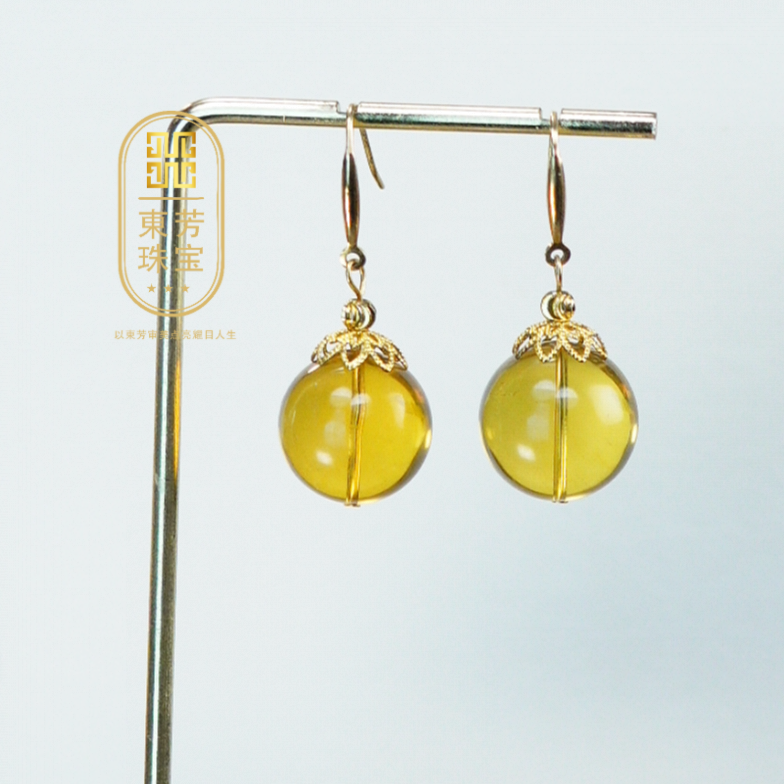 東芳珠宝-17mm墨西哥蓝珀3A净水耳环S925银镶嵌耳勾气质琥珀耳环