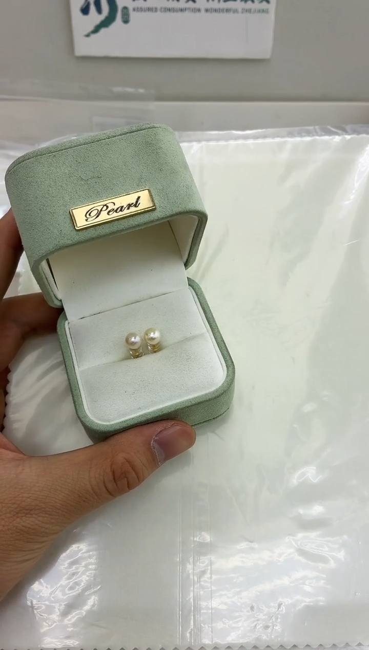 银S925镶嵌DA海水珍珠海水羽皇金耳钉 BQ022