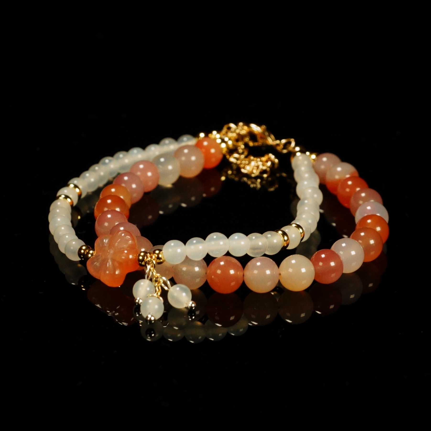 盐源白玛瑙双圈梅花手串