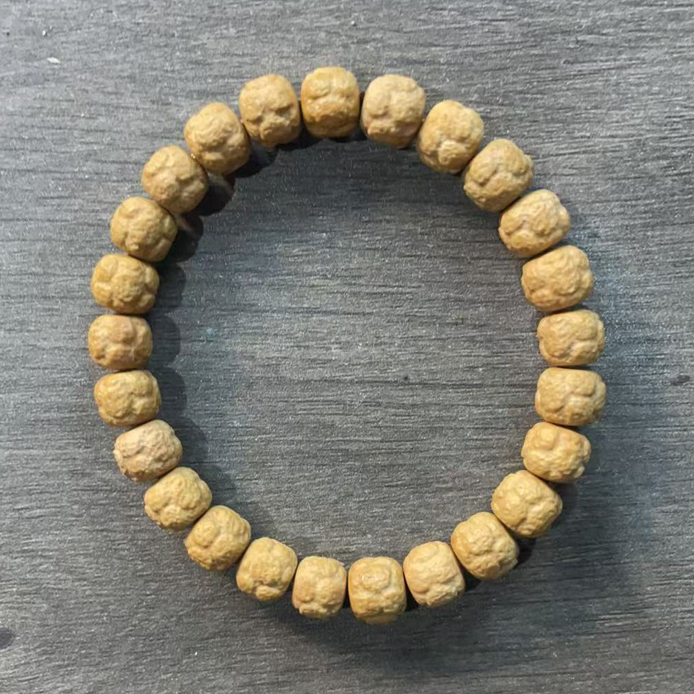 A228龙蛇雕刻猴头卡1.0单圈手串