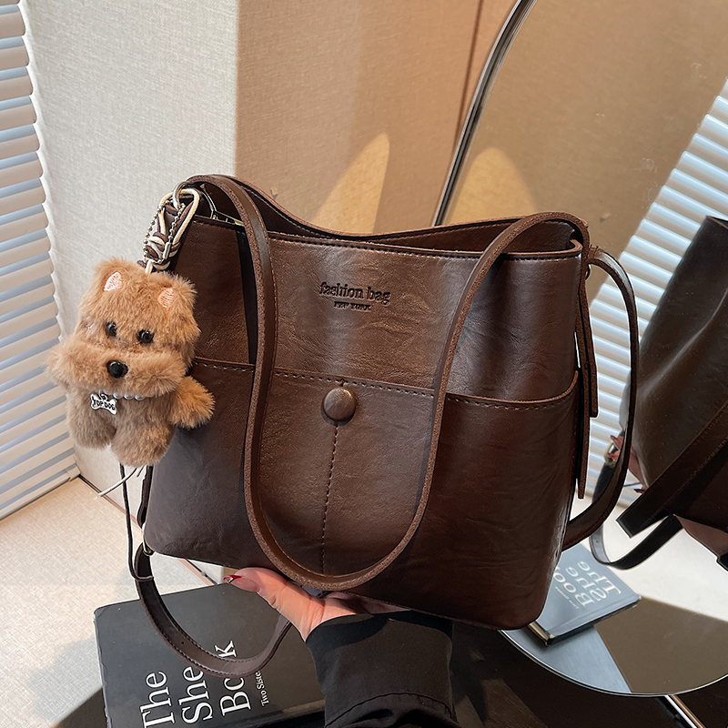 佐猫包包女款爆款2025新款水桶包大容量包包通勤包单肩包斜挎包女