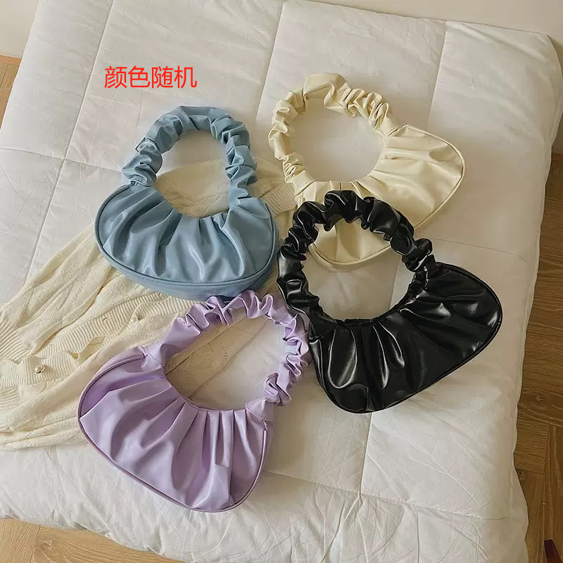 皮质手提包（颜色随机）
