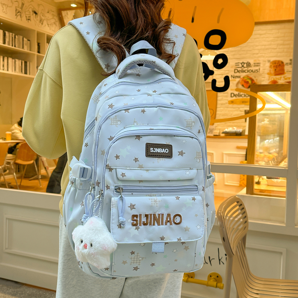 新款初中生高中生书包大学生简约百搭双肩包学生轻便春游女生背包