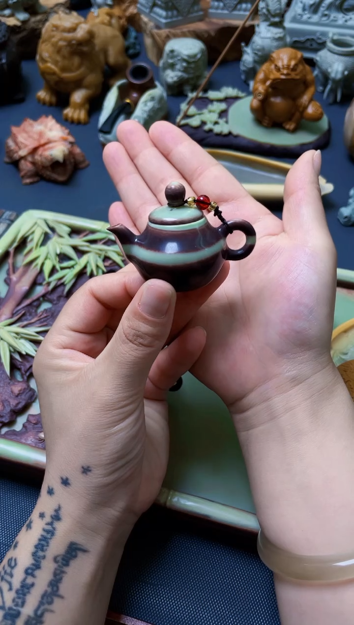 紫袍玉带石把把壶