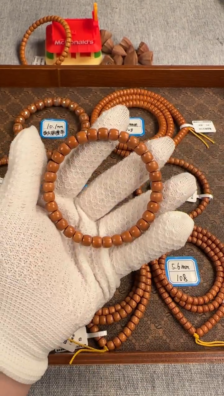 橄榄核手串7.6mm高油高密老挝核尖单圈微瑕福利款（轻微色差）