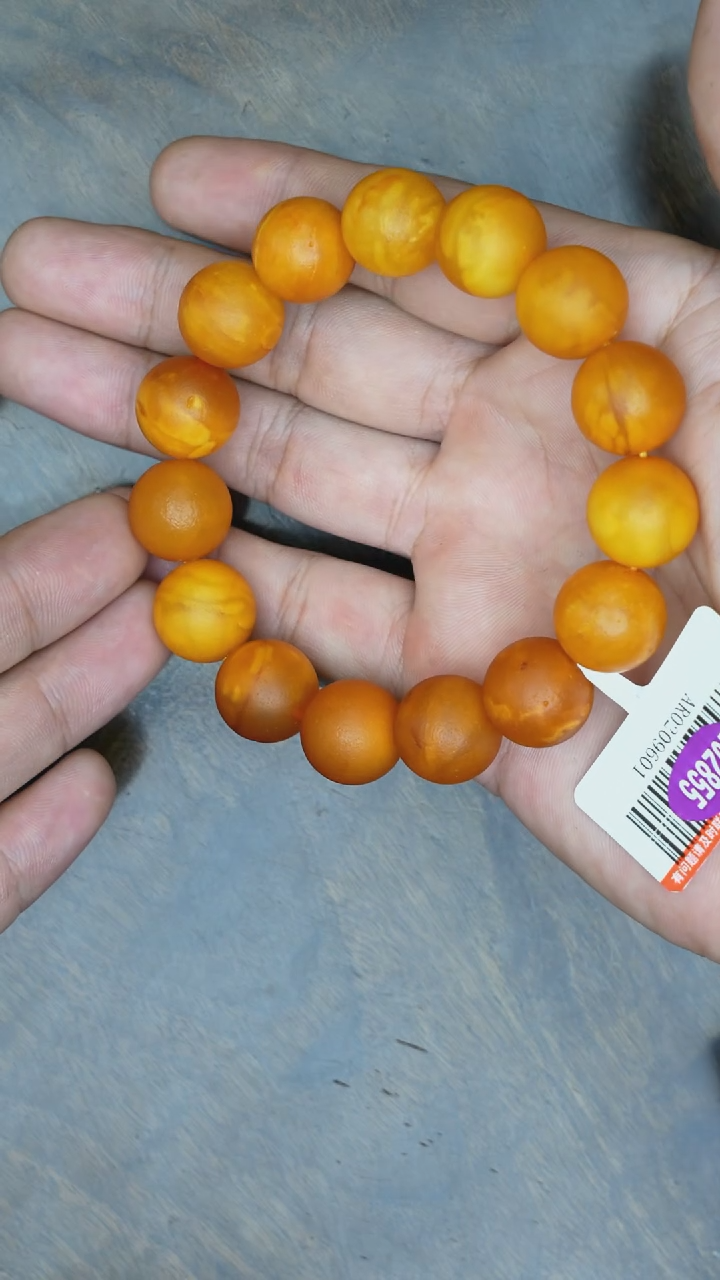 【闪购商品】琥珀裸石未镶嵌老蜡微瑕圆珠橘皮手串
