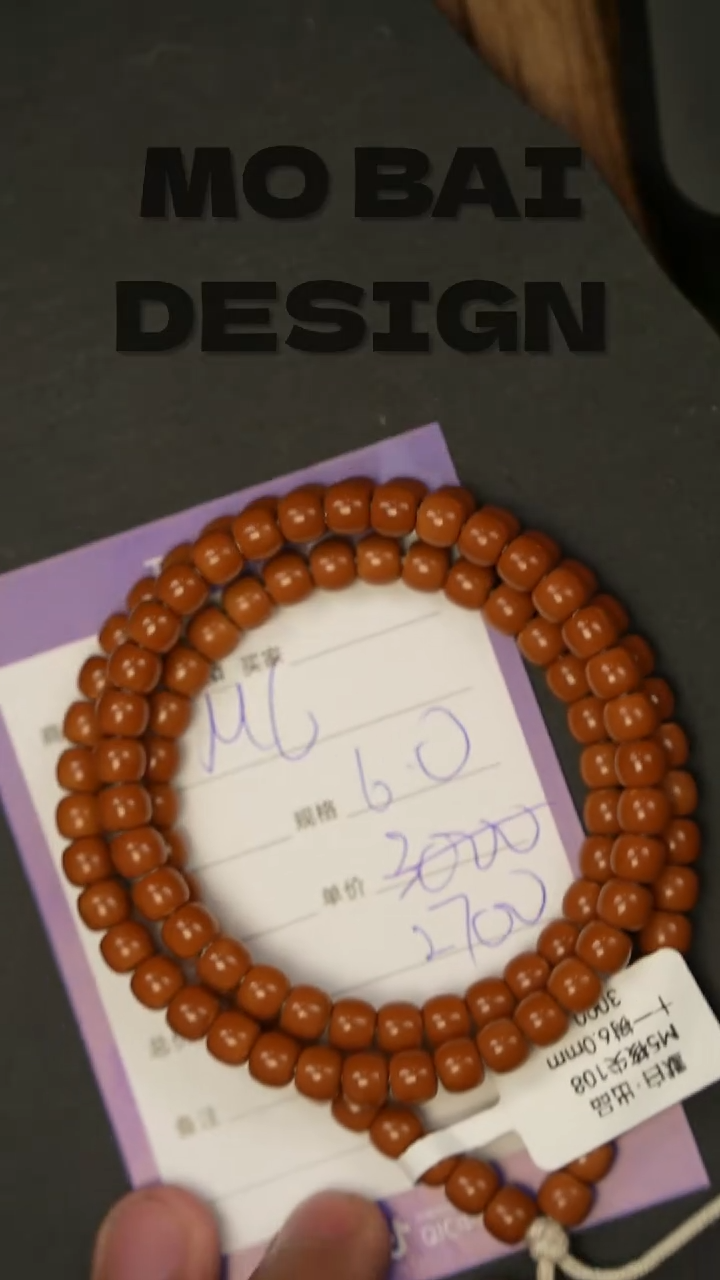 橄榄核吊坠精工细作 终成大器