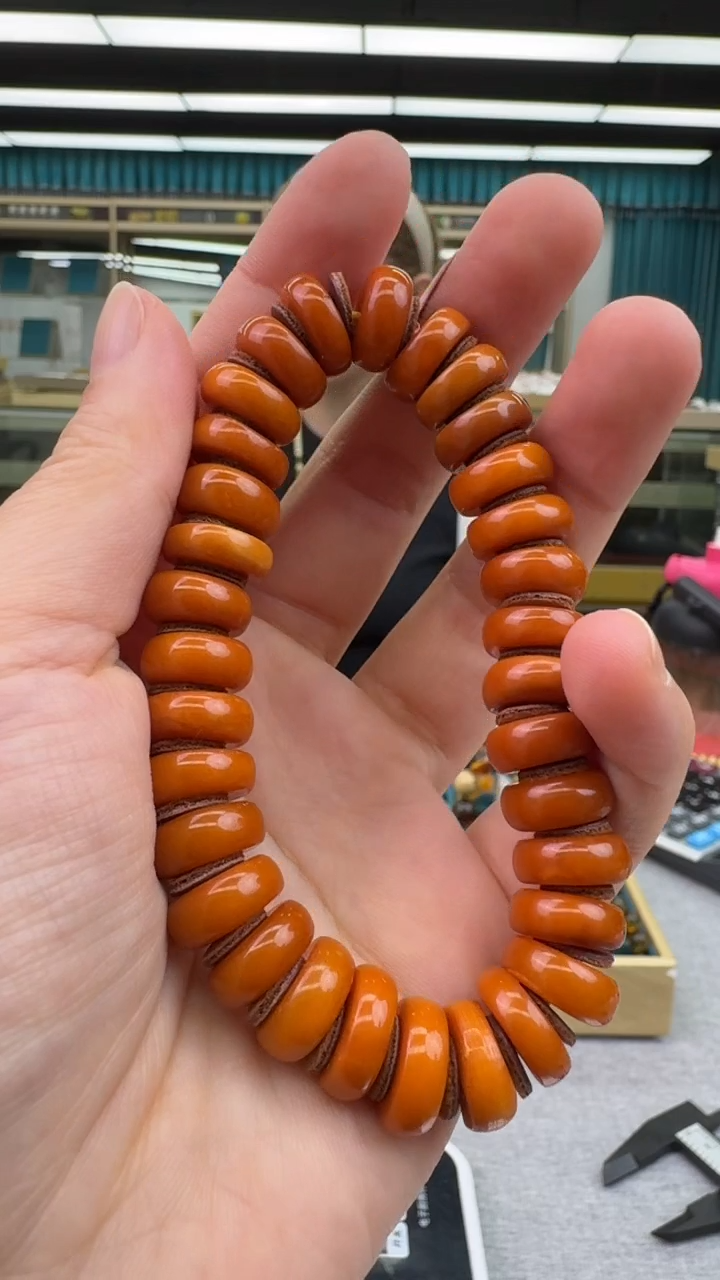 未镶嵌琥珀手链77秒拍号