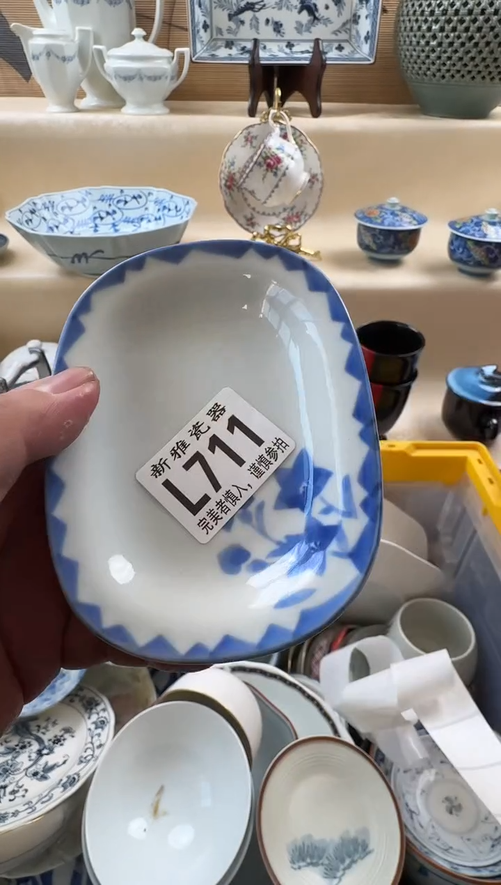 瓷片我****?          L711