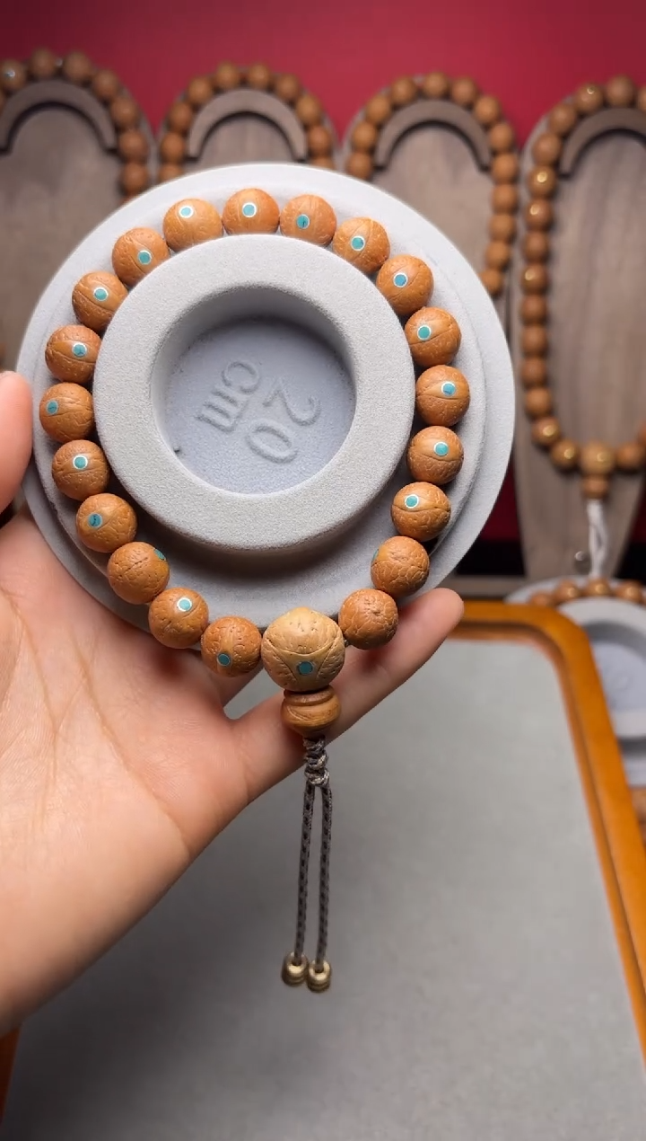 吊坠凤眼菩提S*11.5凤眼松钉手串