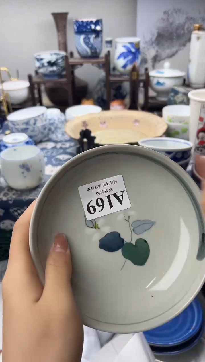 瓷片八****?   A169