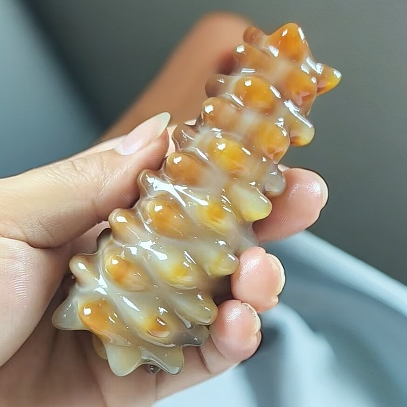 精品牛角海参棒手把玩件按摩梳子加厚按摩头部刷肩颈背部全身通用