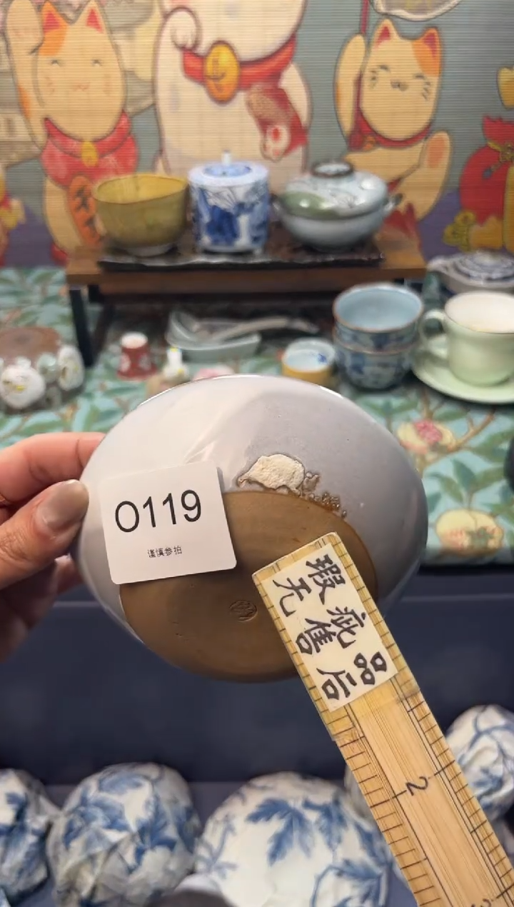 瓷片奇**怪     O119