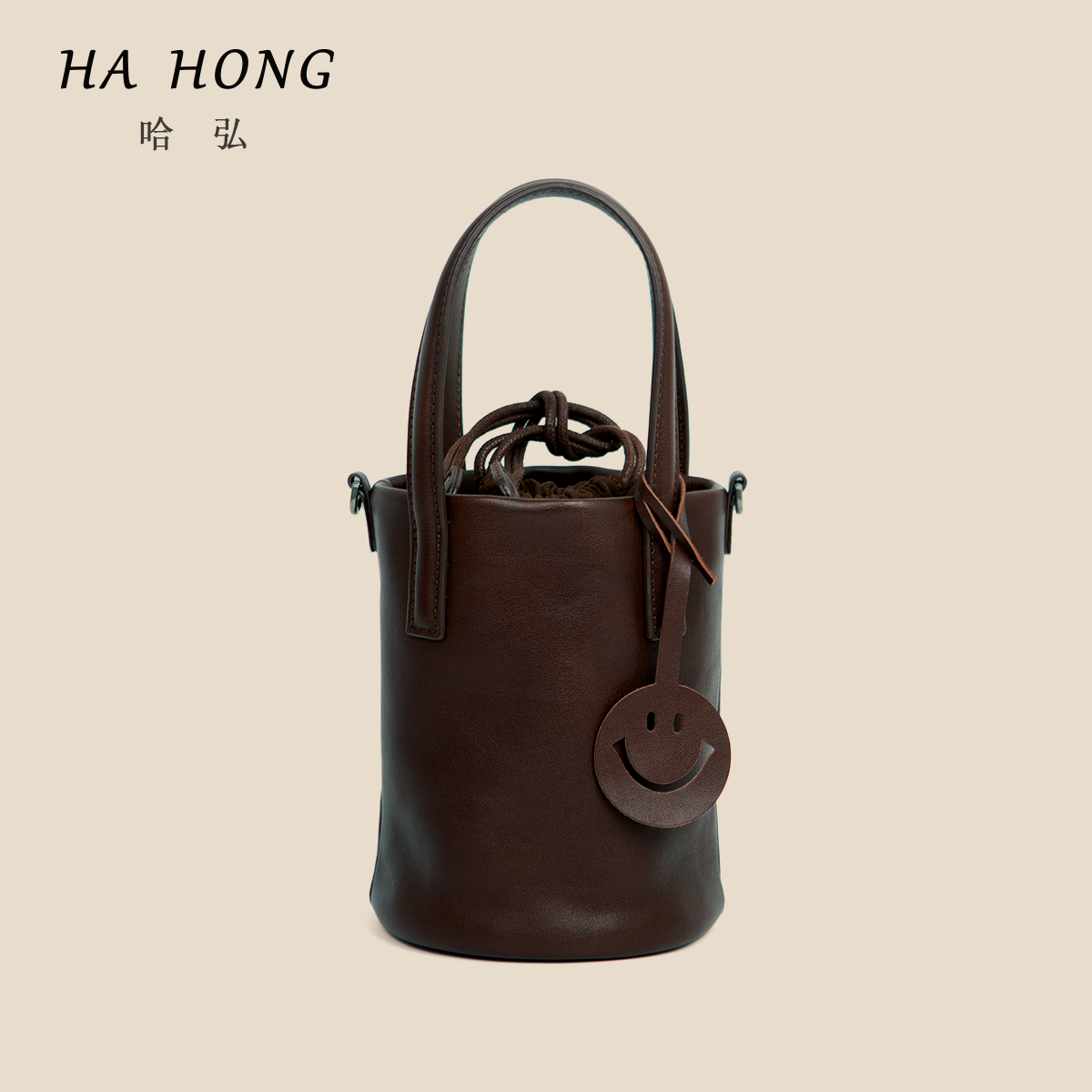 哈弘植鞣头层牛皮秋冬新款复古文艺笔筒包小众手提斜挎女包水桶包