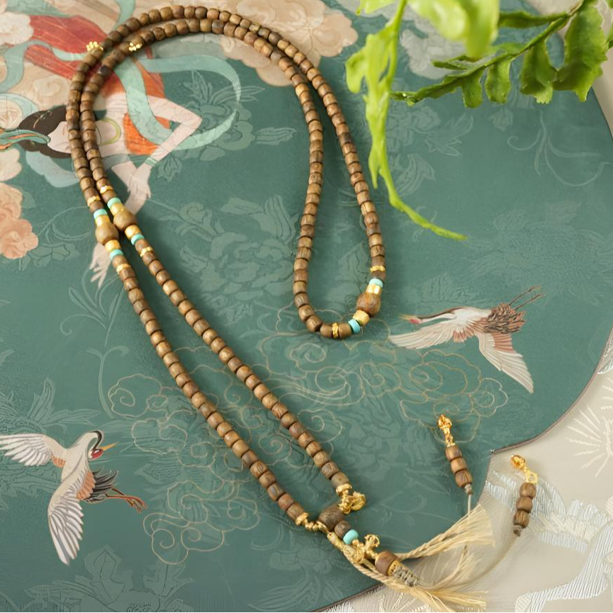 沉香奇楠沉香鼓珠绿松长串（乌身）